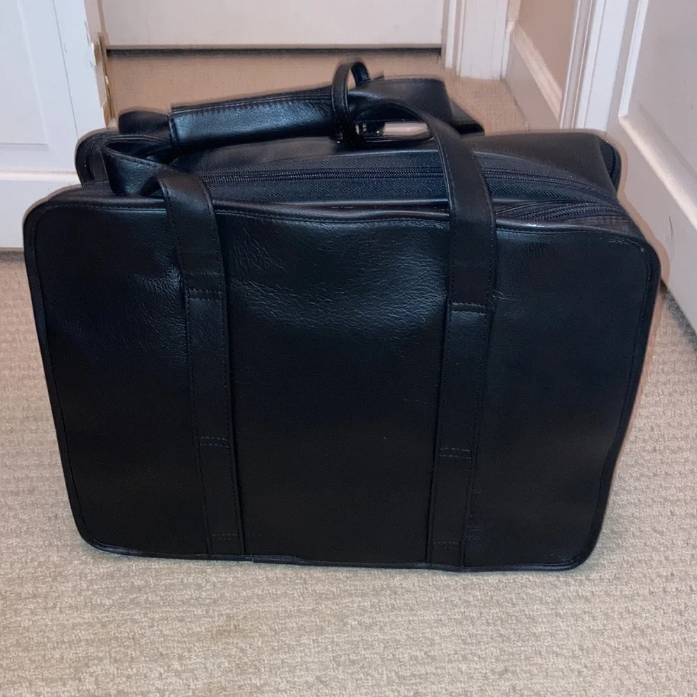 NWT black leather expandable multiple pockets with shoulder strap